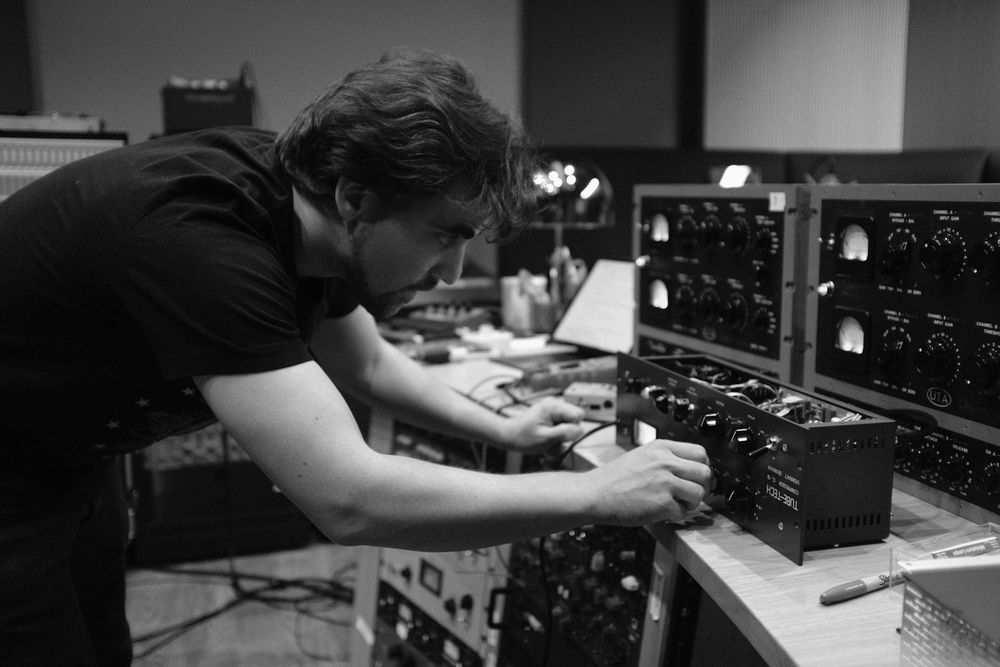 Stefan Richter working on a rack of outboard gear.
