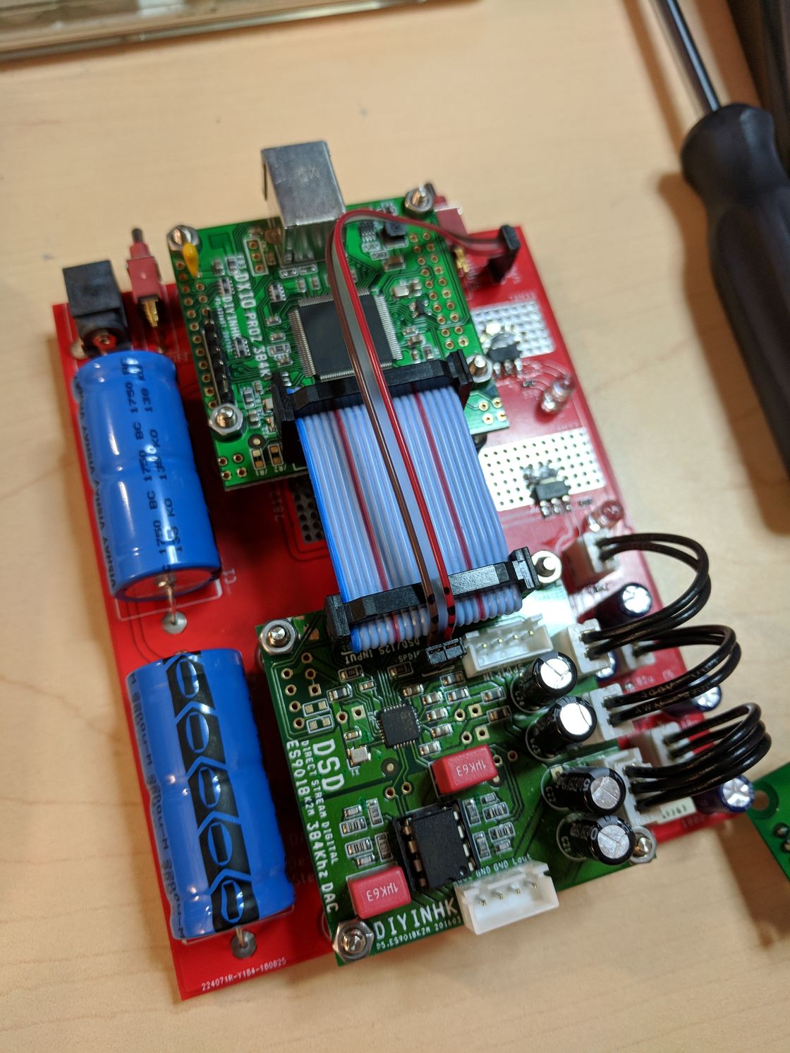 The board mounted in the enclosure.