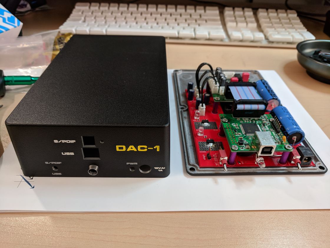 The DAC-1 beside its board.