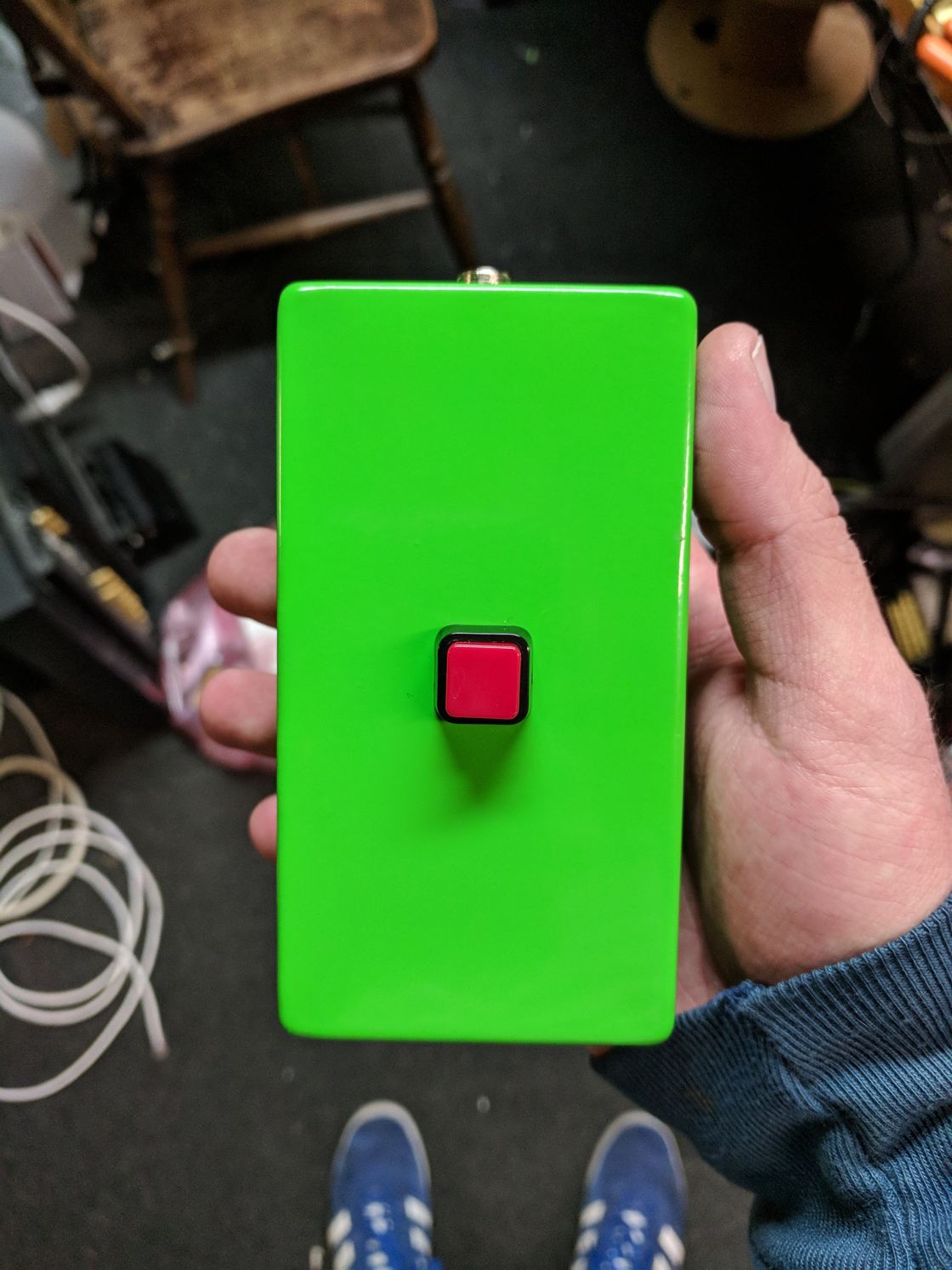 A custom auxiliary button with a green indicator.