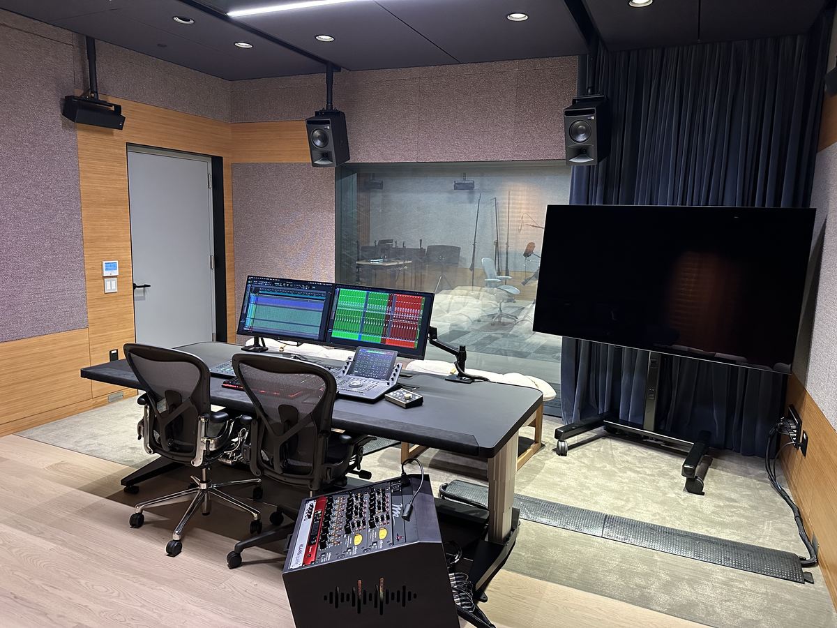 A finished control room seen from the front, gear specced and installed.